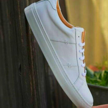 10 All-White Sneakers Travelers Can Actually Keep Clean