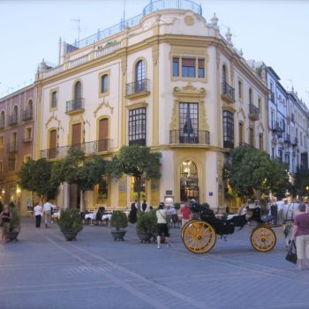 Plaza with horse and carriage in Seville