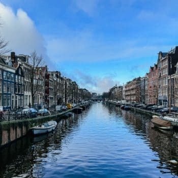 3 days in Amsterdam itinerary - canal with blue sky