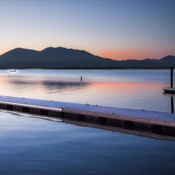 A Volcano Towers Over 100 Miles of Shoreline at This Massive California Lake