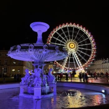 Stuttgart Christmas Markets - Ferris wheel and fountain in Schlossplatz